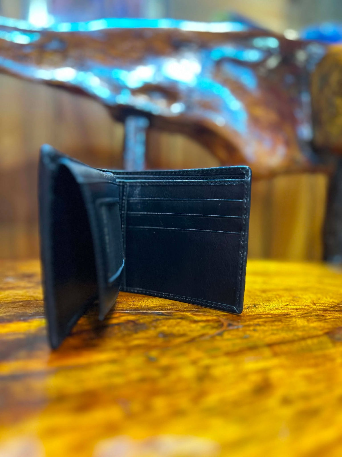 Black crocodile wallet open, card slots