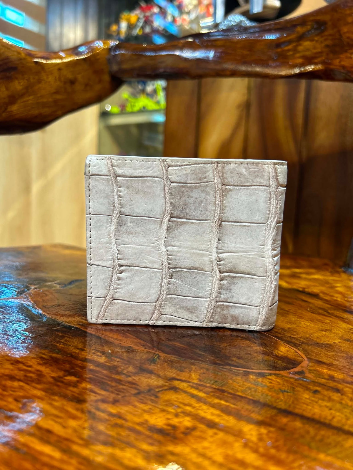 Cream crocodile belly-scale bifold wallet, front