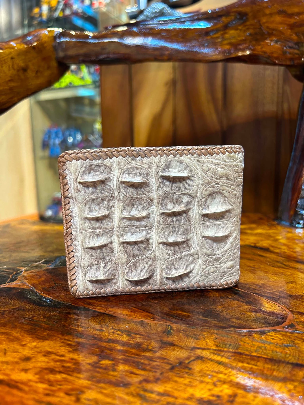 Cream crocodile hornback wallet with hand-laced edges, front