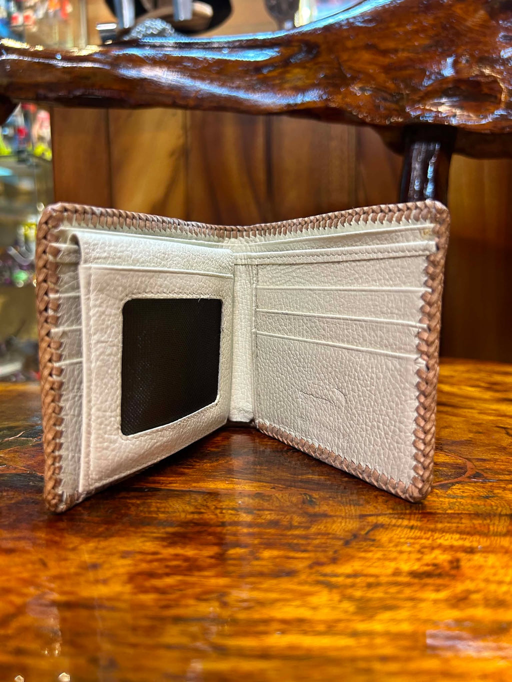 Cream crocodile wallet open, ID window and card slots