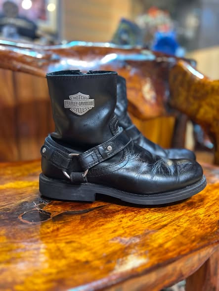 Harley-Davidson Scout black leather boot with harness strap, side view