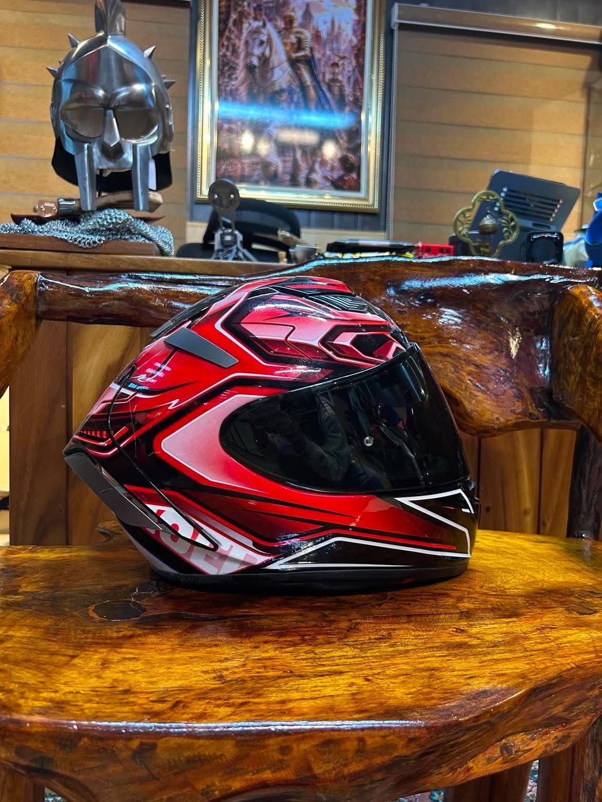 SHOEI full-face helmet in red, black and white, side view