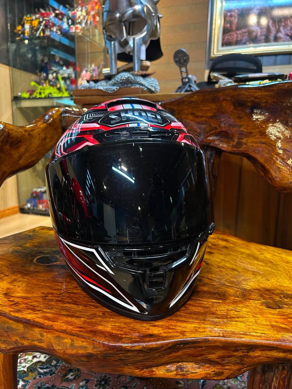 SHOEI helmet front view with dark tinted visor