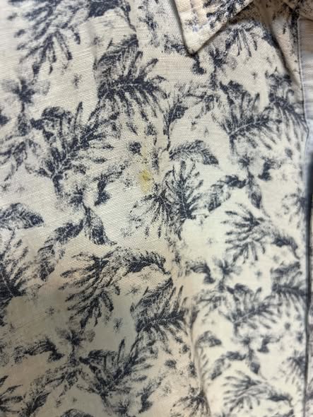 Close-up of small spot on Springfield floral shirt