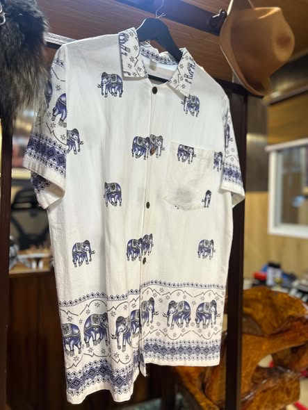 Thai elephant print shirt, angled view